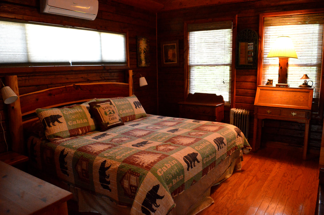 Rustic Orlando Cabin Rental King Size Bed in Master Bedroom